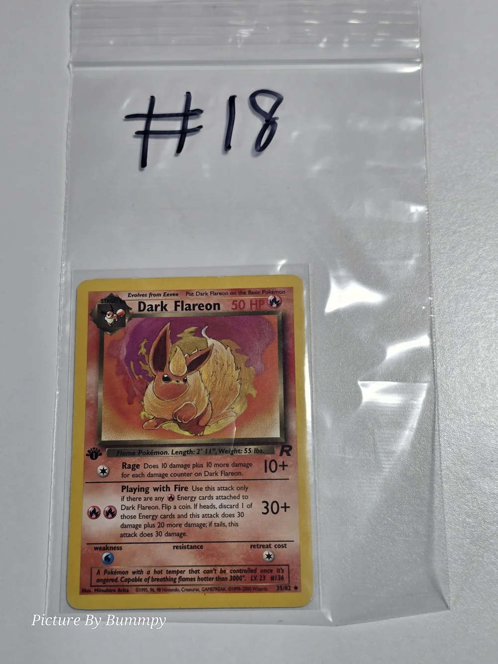 #18 Pokemon 1st Edition Dark Flareon card from the Team Rocket set, # 35/82.